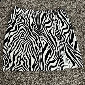 Zebra Print Mini skirt size M petite, worn once! Stretchy! great condition
